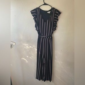 Woman’s jumper suit.